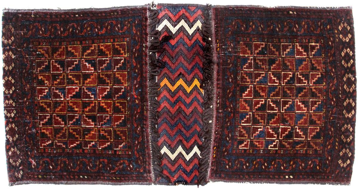 Antique Baluch Khorjin - a Complete Pair of Saddle Bags - זוג שקי מטען - שטיח בלוצי עתיק - Back to list of Oriental Rugs and Carpets