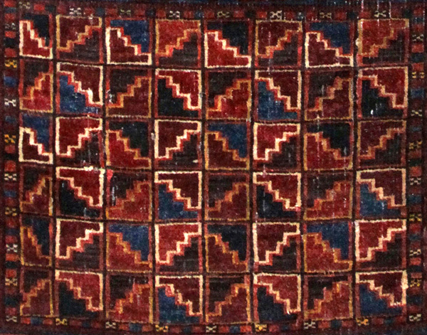 Antique Baluch Khorjin - the central part of each of bag face is a grid made of eight columns and six rows - Click to Zoom